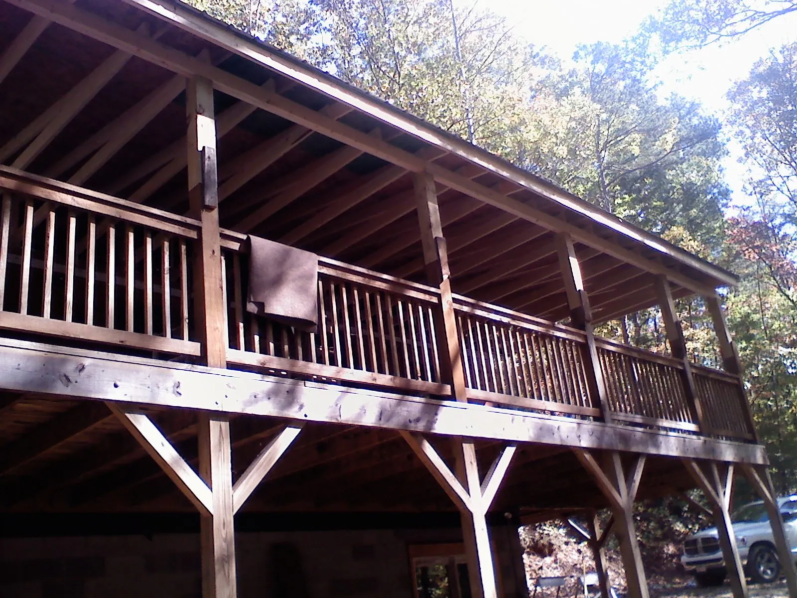 Timber framing under a new elevated porch and deck — Roof Leak Repair in Allston by Roofing Brothers